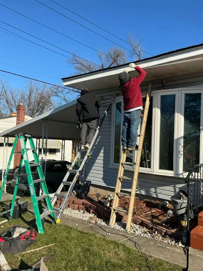 Restoration crew performing exterior repair in Picayune
